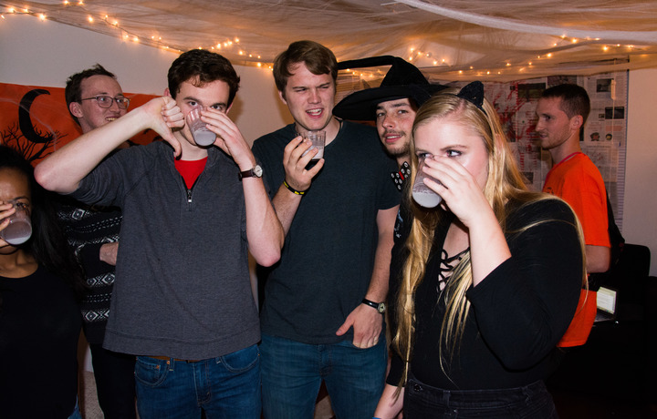 From left to right, Staff Writer Lillian Andemicael, Opinion Editor Max Foley-Keene, and staff writers Zach Phillips, Cameron Neimand and Allison O’Reilly try
        the non-alcoholic "Dewey Fizz."